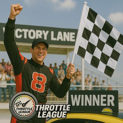 Race winner celebrating with checkered flag.